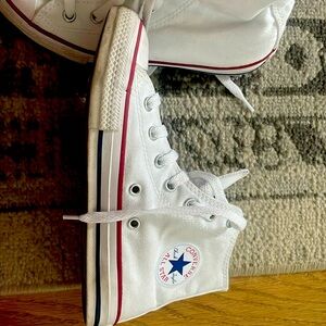 Size 2 white converse high tops.